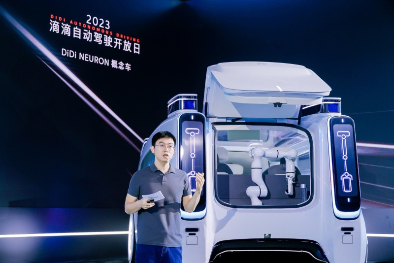 Китайская Didi показала концепт беспилотного такси Neuron с роборукой для погрузки багажа